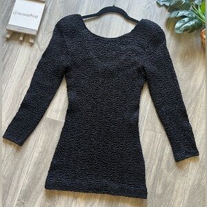 Vintage 80’s smocked popcorn bodycon dress in black. Size O/S